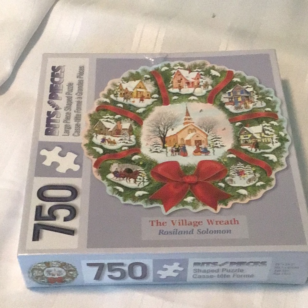 The Village Wreath by Rosiland Solomon puzzle  never been opened